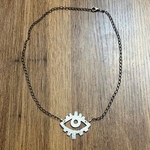 Hammered Metal Cutout Eye Necklace